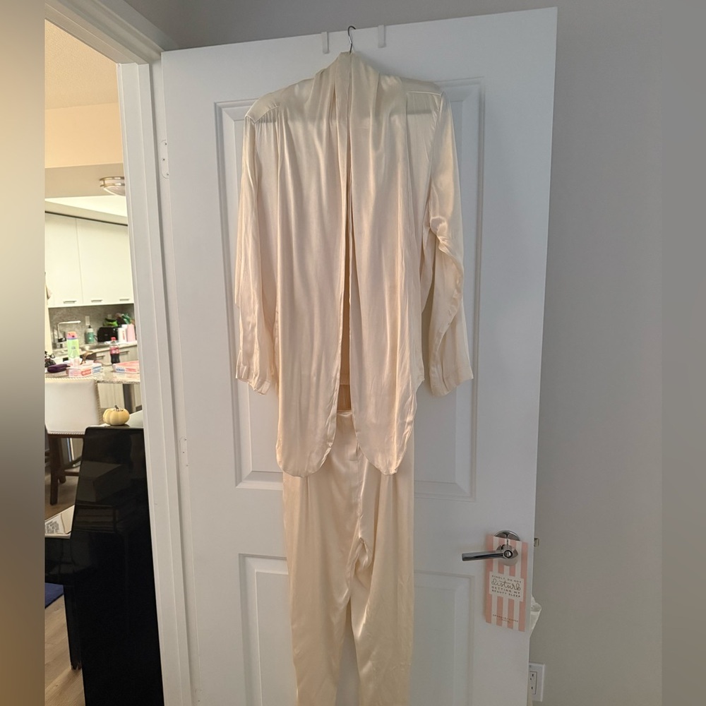 Ivory jumpsuit size medium